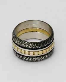 Three band 'Stacking Ring' with oxidised silver and 18K gold central band.